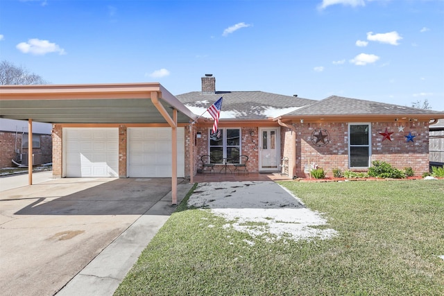 ranch-style house featuring a garage and a front yard