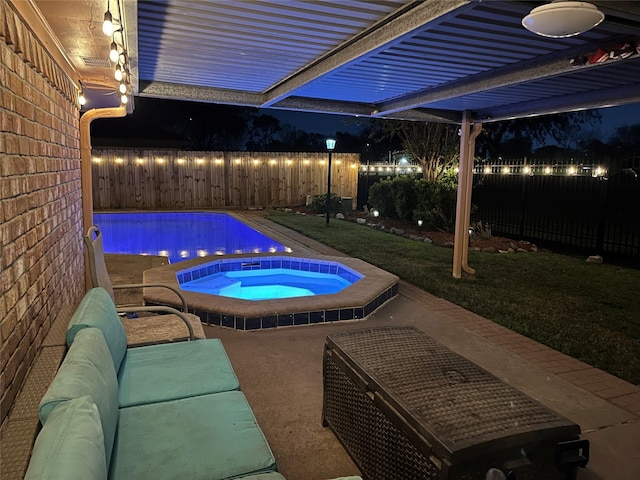 view of swimming pool with an in ground hot tub and a yard