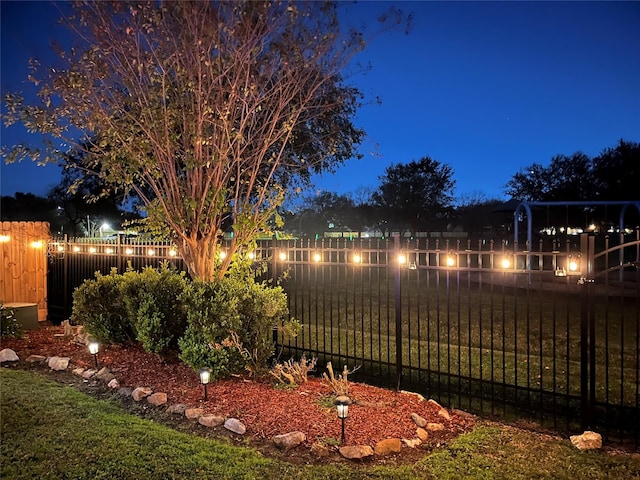 view of yard at night