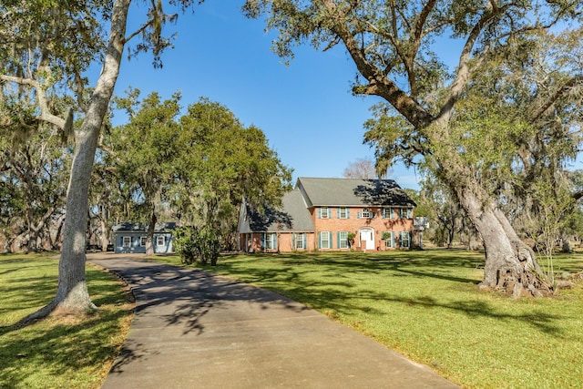 view of front of property with a front lawn