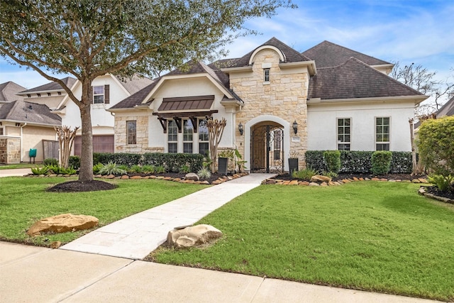 view of front facade with a front lawn