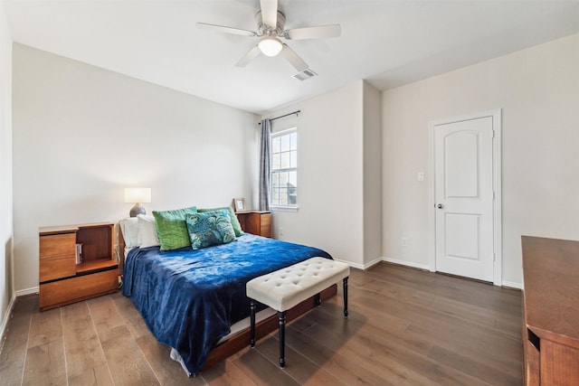 bedroom with ceiling fan and wood-type flooring