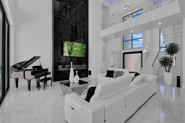 living room with a towering ceiling