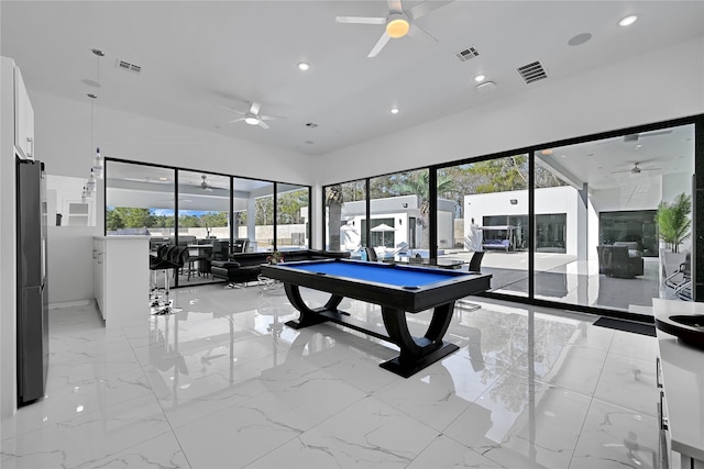 game room with ceiling fan and pool table