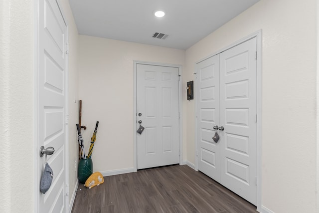 entrance foyer featuring dark hardwood / wood-style floors