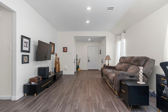 living room featuring dark hardwood / wood-style floors