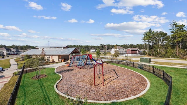 view of playground featuring a yard