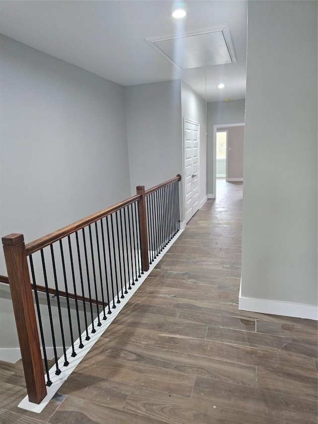 hallway with dark wood-type flooring