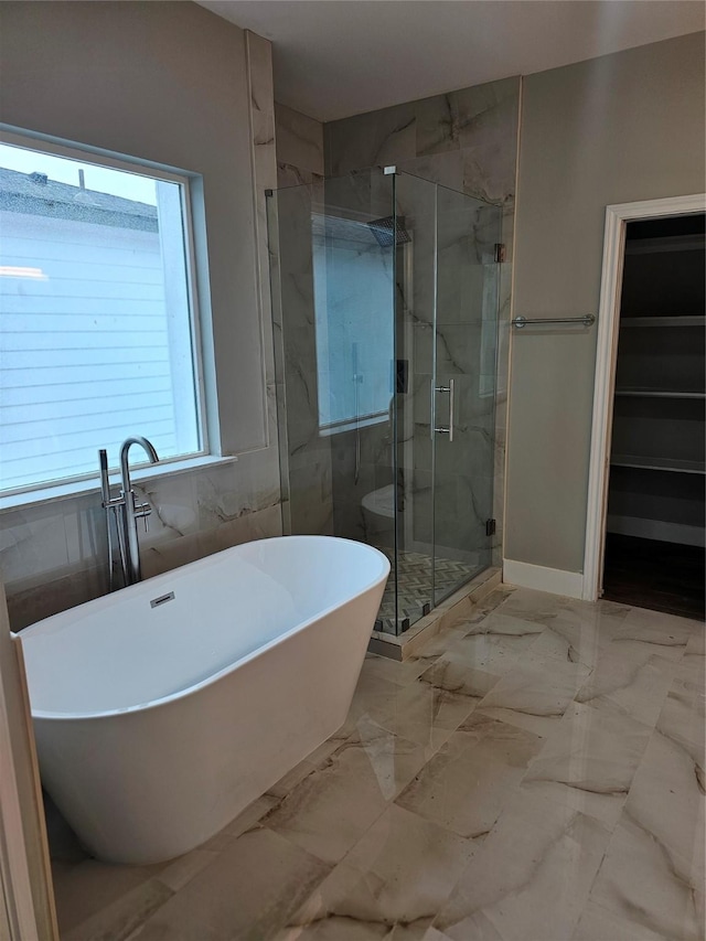 bathroom with independent shower and bath