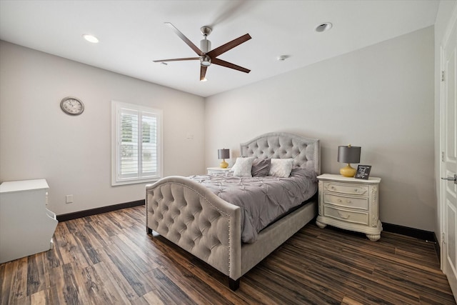 bedroom featuring dark hardwood / wood-style flooring and ceiling fan