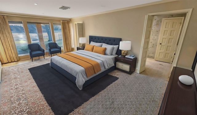 bedroom featuring ornamental molding and ensuite bathroom