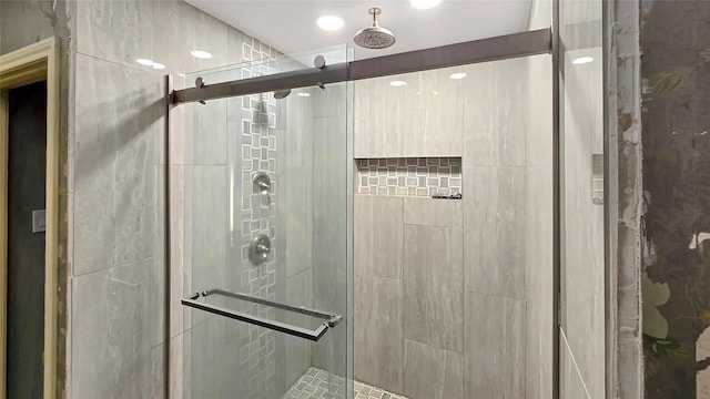 bathroom featuring an enclosed shower