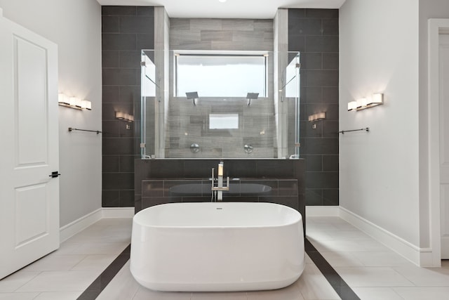 bathroom featuring tile patterned floors and plus walk in shower