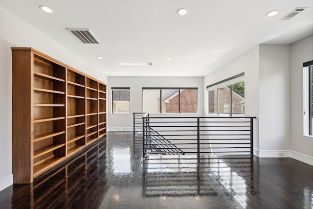 interior space with dark wood-type flooring