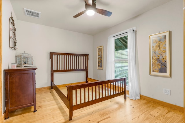 bedroom featuring ceiling fan and light hardwood / wood-style floors