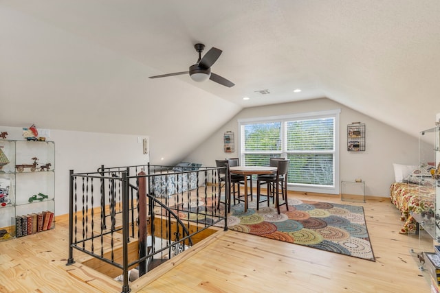 bonus room featuring vaulted ceiling, ceiling fan, and light hardwood / wood-style floors