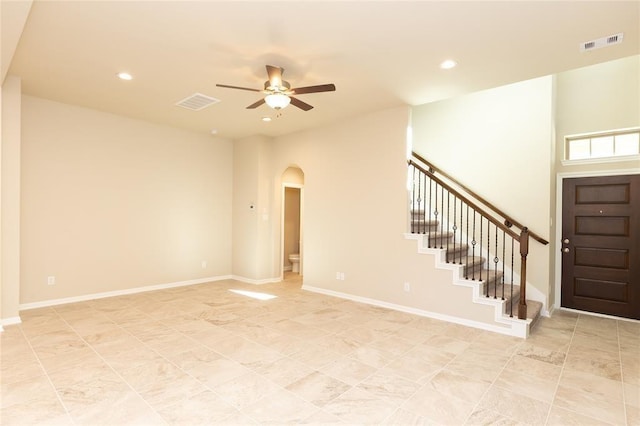 interior space featuring ceiling fan