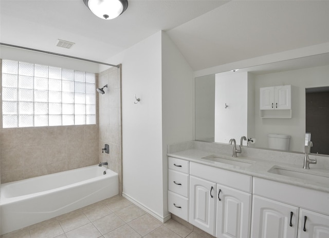 bathroom with vanity, tile patterned floors, and toilet