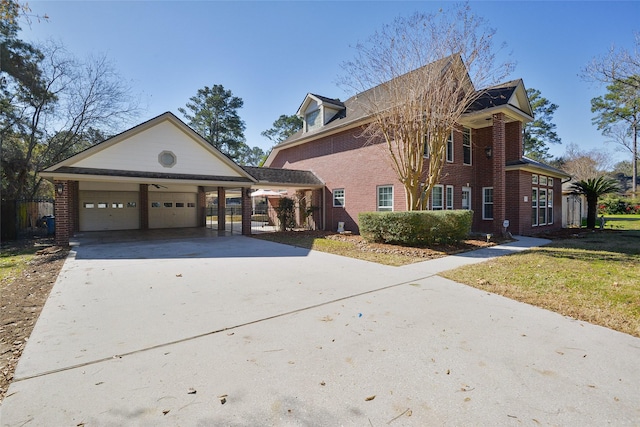 view of front facade featuring a garage and a carport