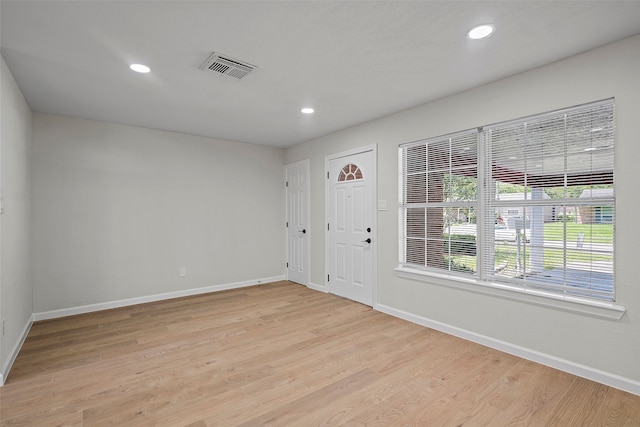 entrance foyer with light wood-type flooring