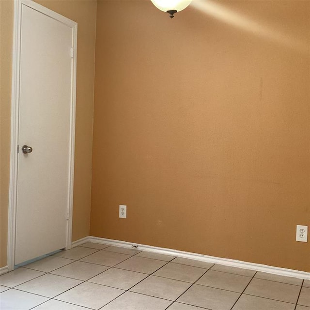 view of tiled spare room