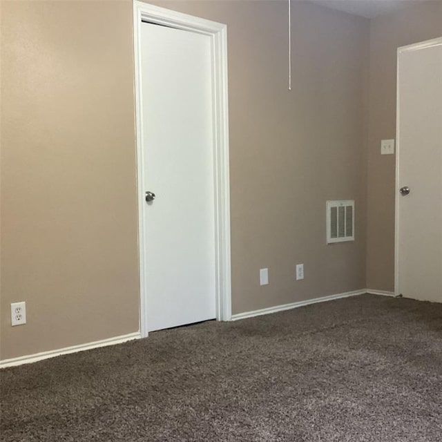 spare room with carpet flooring