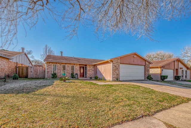 view of front facade featuring concrete driveway, an attached garage, fence, a front yard, and brick siding