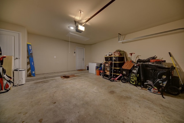 garage featuring a garage door opener