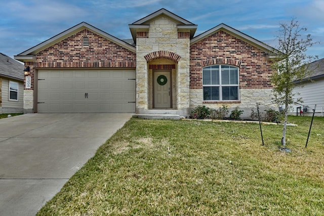 view of front property featuring a garage and a front yard