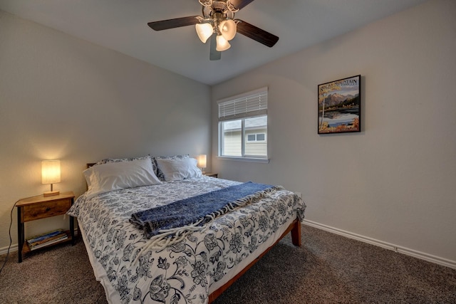 bedroom with dark carpet and ceiling fan