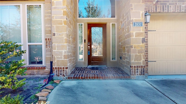 property entrance featuring a garage