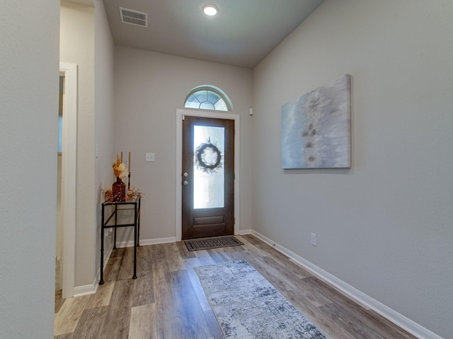 foyer with light hardwood / wood-style floors