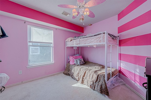 bedroom featuring carpet flooring and ceiling fan