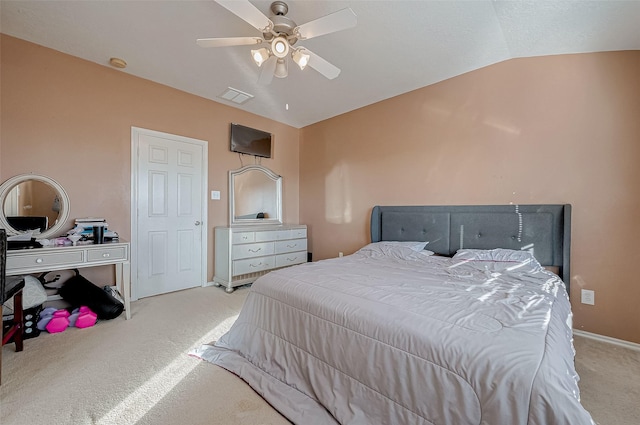 carpeted bedroom featuring ceiling fan and lofted ceiling