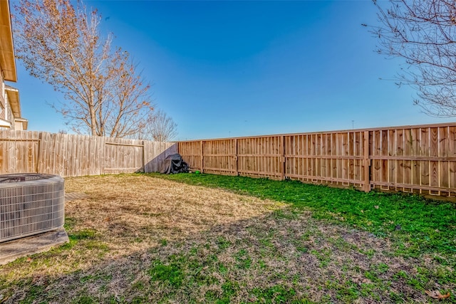 view of yard with central AC