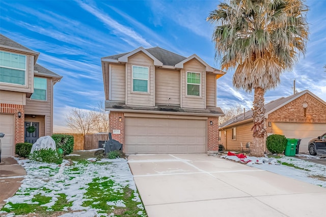 view of front of home with a garage