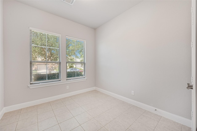 view of tiled spare room