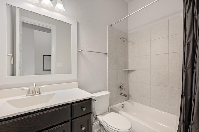 full bathroom with vanity, toilet, and shower / bath combo with shower curtain