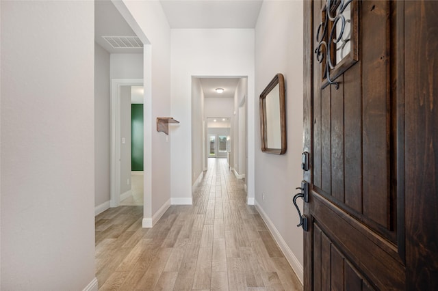 foyer with light hardwood / wood-style flooring