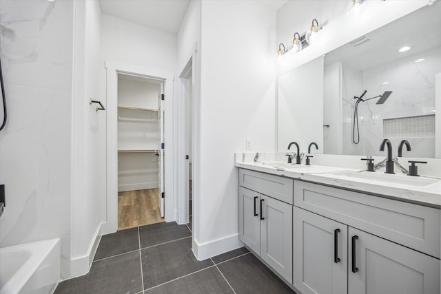 bathroom with vanity and tile patterned flooring