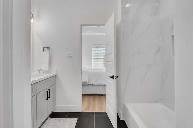 bathroom with vanity and tile patterned flooring