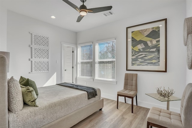 bedroom featuring light wood-type flooring and ceiling fan