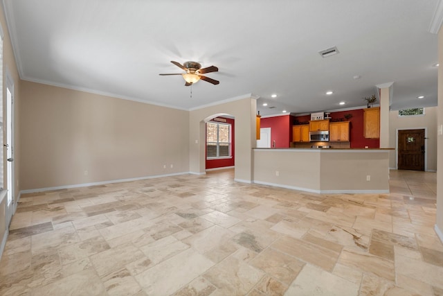 unfurnished living room with crown molding and ceiling fan