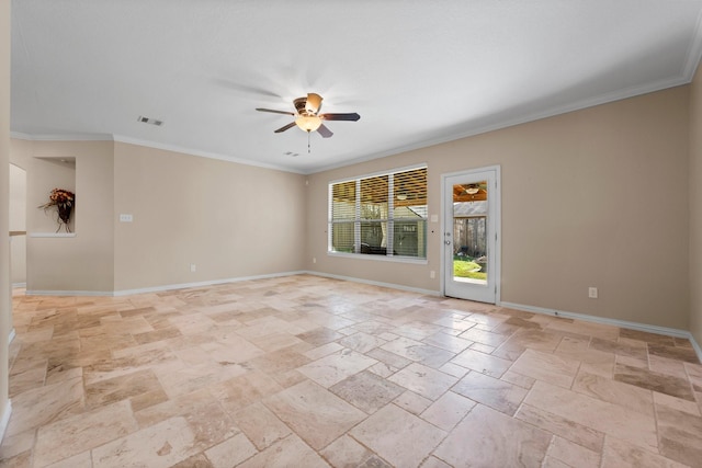 spare room featuring crown molding and ceiling fan