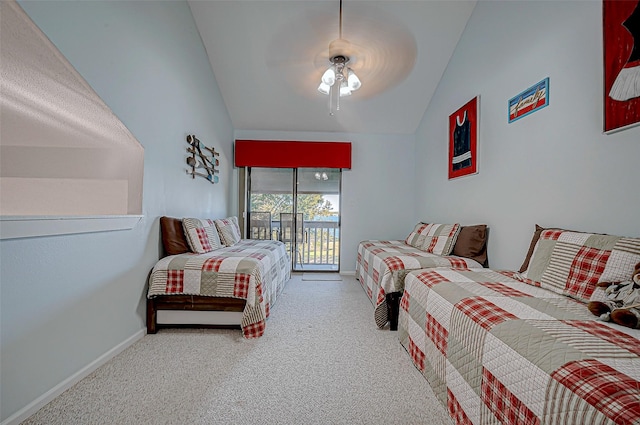 carpeted bedroom featuring access to exterior, vaulted ceiling, and ceiling fan