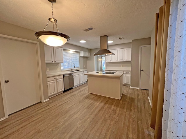 kitchen featuring sink, island range hood, a center island, hanging light fixtures, and dishwasher