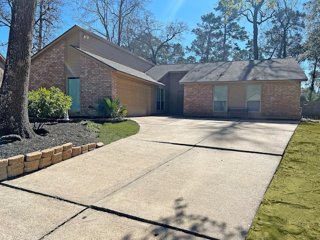 single story home featuring a garage