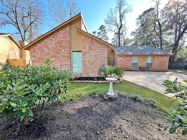 exterior space featuring a patio and a front yard