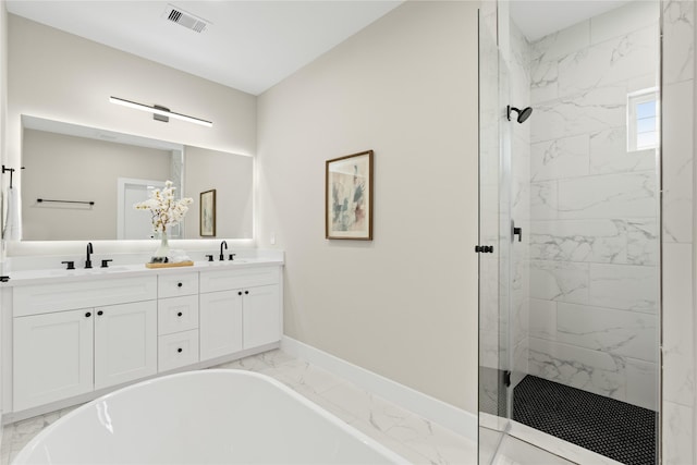 bathroom featuring vanity and shower with separate bathtub