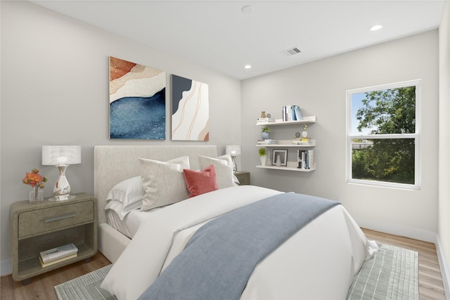 bedroom featuring wood-type flooring